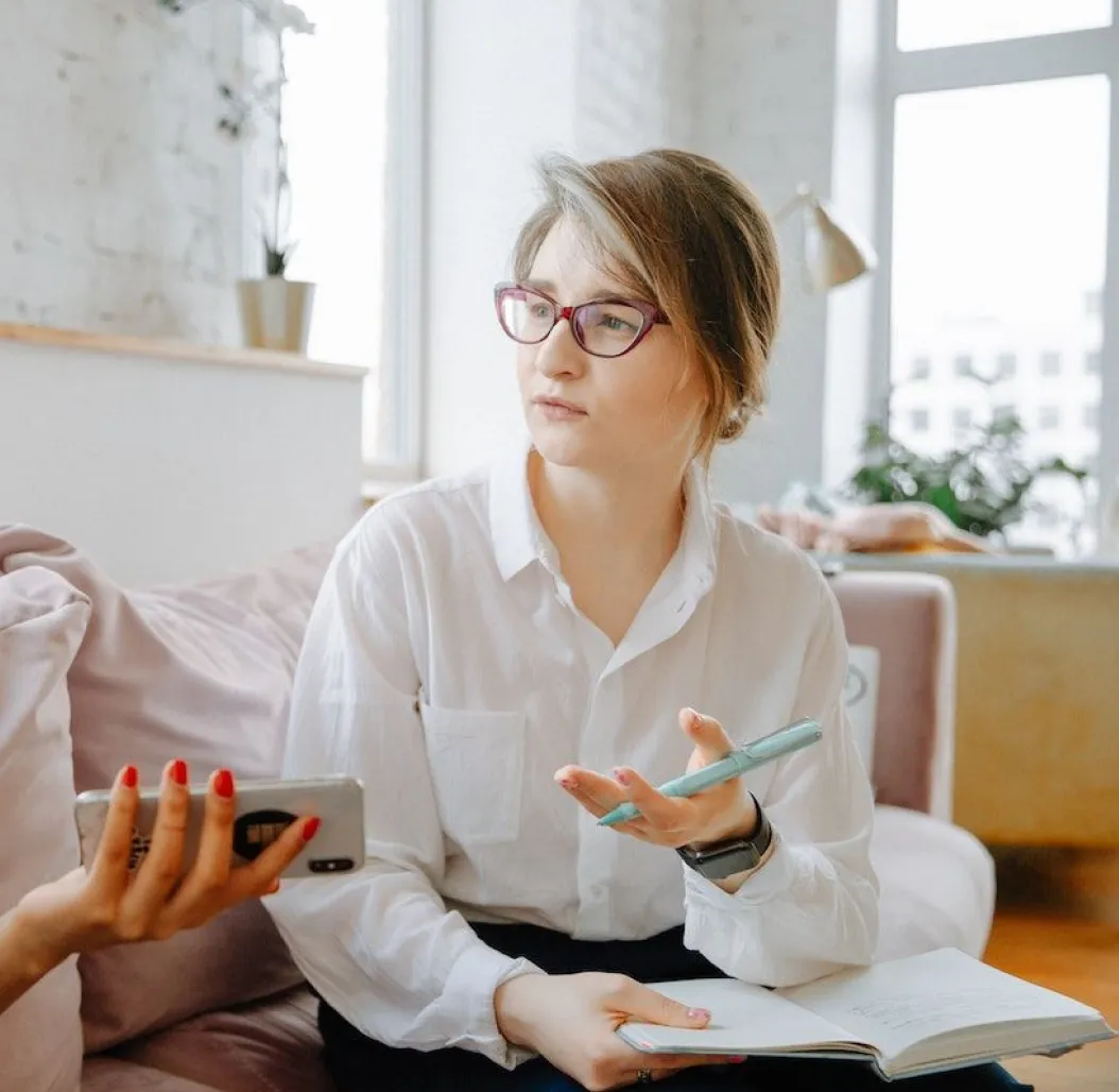 A therapist taking notes